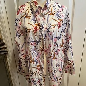 Women’s button up blouse. Pretty cream base with blue, rust, pink print.